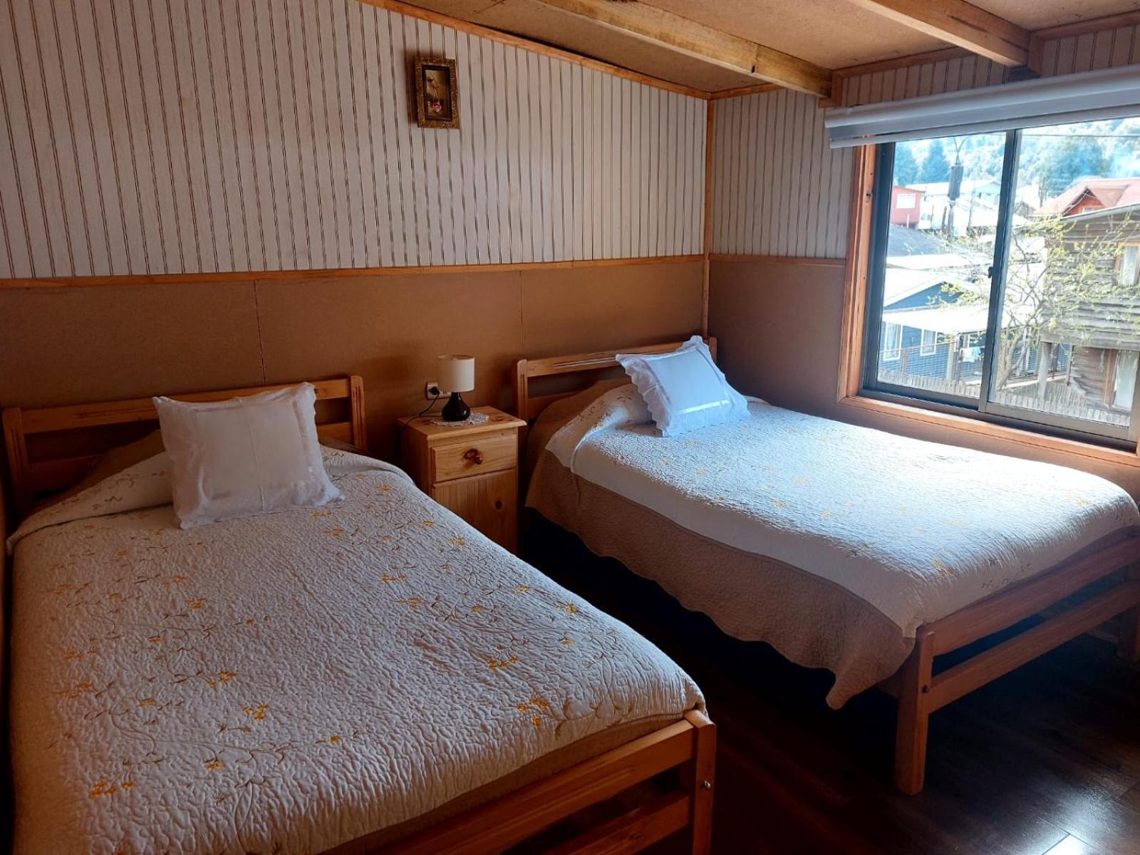 Hostal Y Cabanas Ventisquero Puerto Puyuguapi Luaran gambar